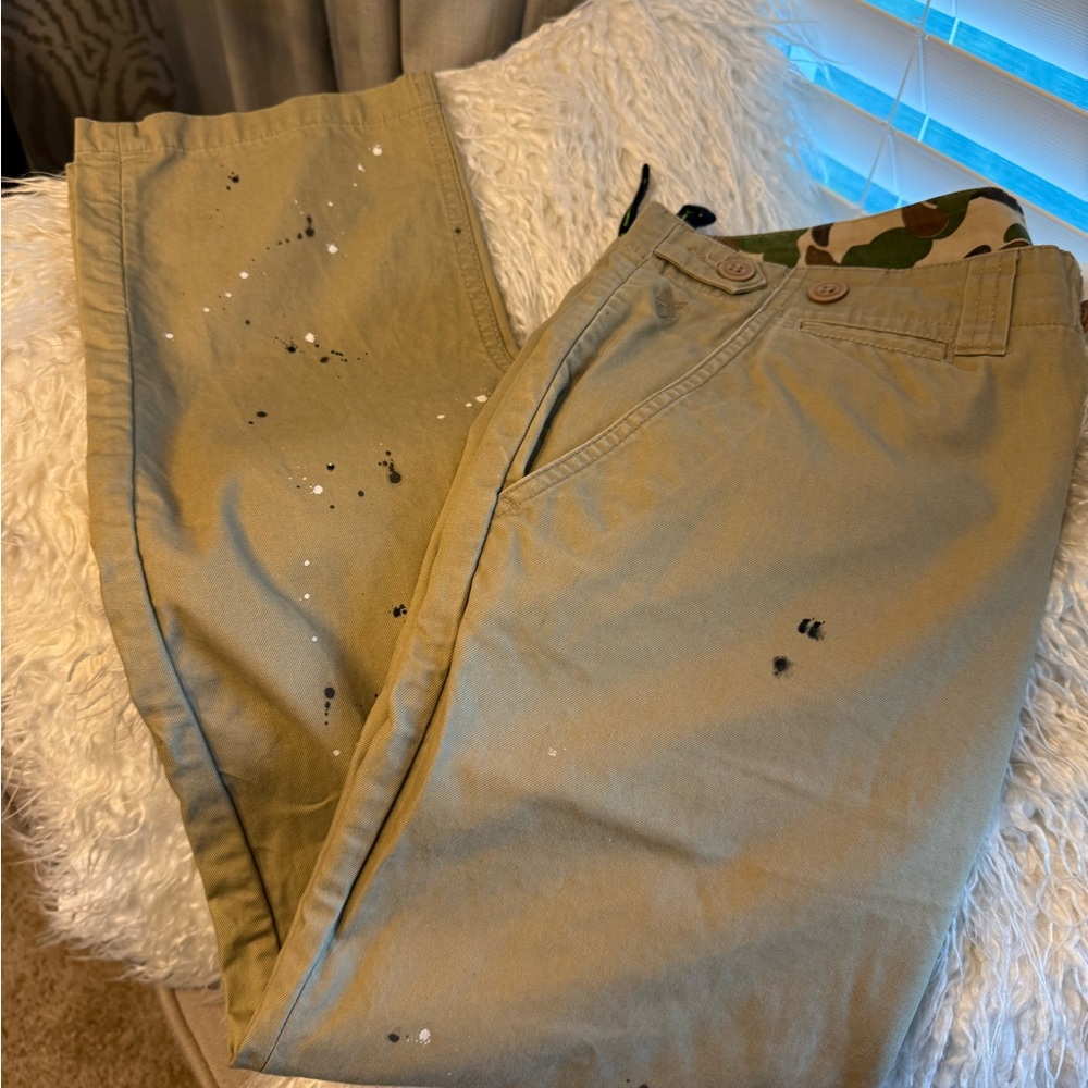 Stylish Paint-Splattered Khaki Pants. Distressed look with paint